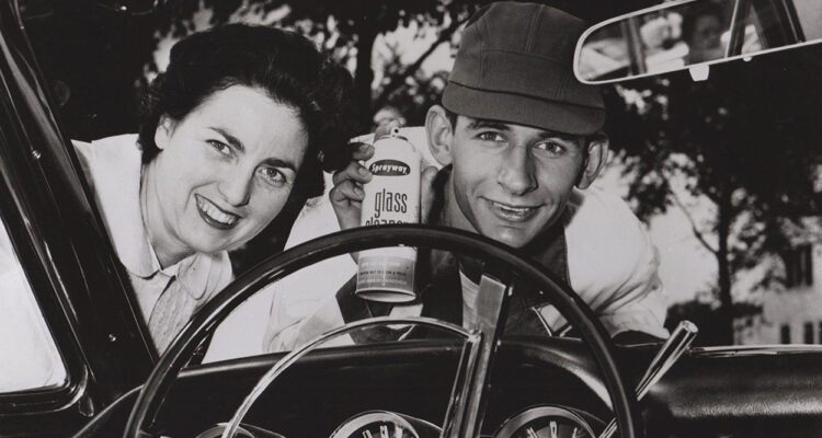 black and white photo demonstrating sprayway glass cleaner on vehicle windshield